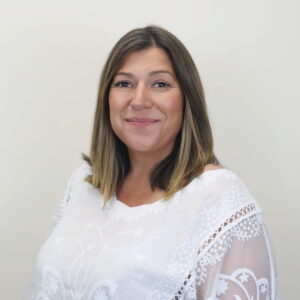 A professional headshot of our Director, Ruth Parker 