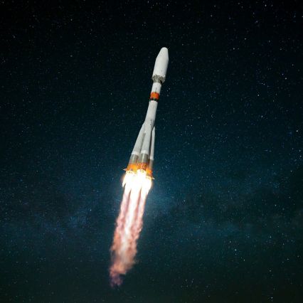 A rocket launching into space.