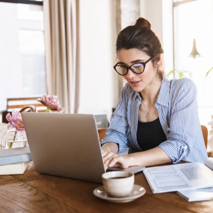A woman working from home - benefits of working from home