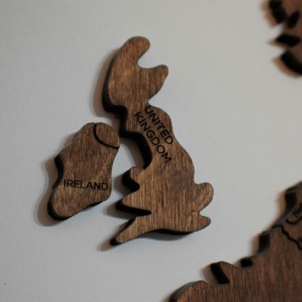 A wooden map of the UK.